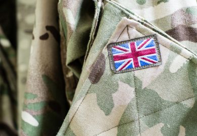 Union Jack flag on sleeve of British military camouflage uniform