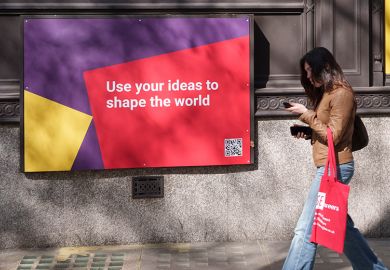 A woman walks past a banner that advertises courses for the LSE, on 9 April 2025, in London, England. The advert states "use your ideas to shape the world". To illustrate that Skills White Paper is a 'quid pro quo' for universities.