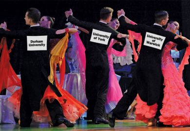 University-branded ballroom dancers dancing University-branded ballroom dancers dancing