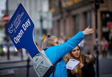 University open day guide and student, illustrating the record number of UK 18-year-olds applying to university.