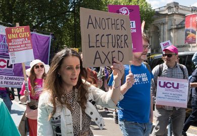 Members of the UCU from the higher education sector march to demand fair pay, secure jobs and real investment in higher education system amid funding cuts, staff redundancies and plummeting international enrolments in London, 10 May 2025.
