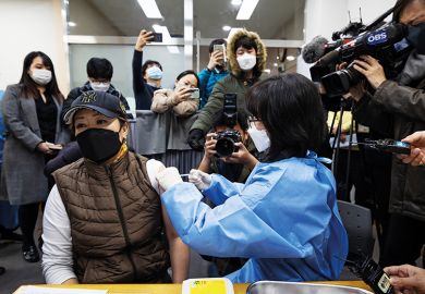 Media documents a nurse administering the AstraZeneca Covid-19 vaccine at a public health centre in Incheon, South Korea, in February 2021