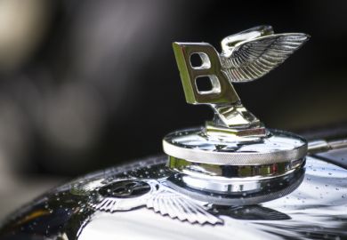 Vancouver, Сanada - May 18, 2013 Hood ornament detail from an antique Bentley automobile, seen at the annual All-British Field Meet classic and collector car event.
