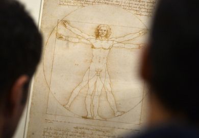 People look at the "Vitruvian Man" a drawing by Leonardo da Vinci, illustrating the combination of arts and science