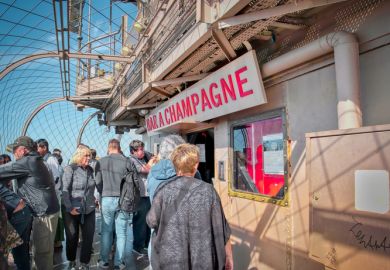 Visitors at the champagne shop located on top of the Eiffel tower