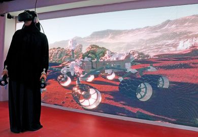 Muslim woman wears VR headset