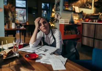 A tired student waitress