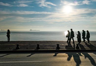 people walking on beach