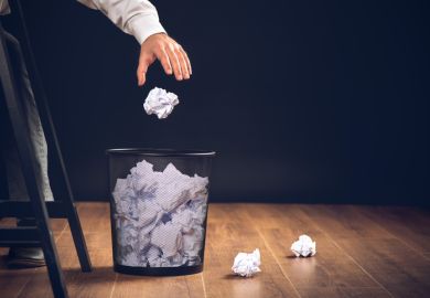 A wastepaper basket A wastepaper basket illustrating an opinion article about discrimination against non-native English speakers in journal publication