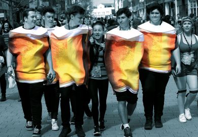 Chichester University's charity pub crawl group dressed in larger outfits for a metaphor for As freshers make up for forgone alcohol experiments during lockdown