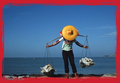 A young girl carrying granite blocks in China A young girl carrying granite blocks in China to illustrate Hidden strengths