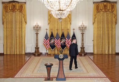  President Joe Biden walks away from the podium 
