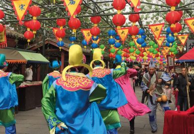 Dancers hanging banners
