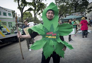 People participated in the march calling for the legalization of marijuana in Tokyo to illustrate Marijuana scandals test Japanese university leaders