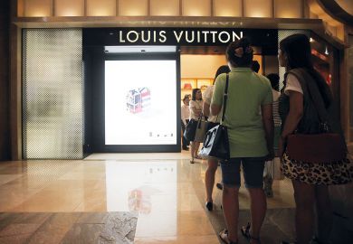 Customers wait in line outside a Louis Vuitton store n Seoul, South Korea Customers wait in line outside a Louis Vuitton store n Seoul, South Korea, to illustrate High costs fail to dim Seoul’s allure to Korean students