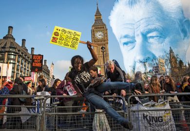 Montage of potestors jumping over the barriers surrounding Parliament Square during a march against student university fees with Lord Robbins portrait in the background to illustrate Do we need another Robbins report? Only if  it faces up to finance