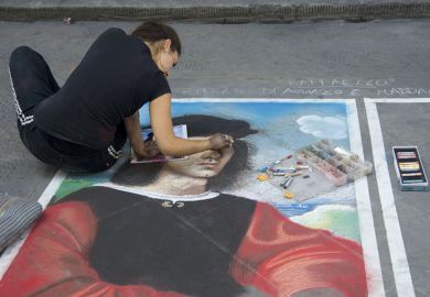 woman draws portrait on pavement with crayons woman draws portrait on pavement with crayons