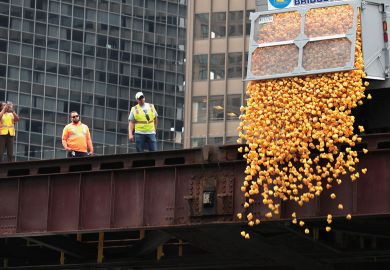 Rubber ducks are dropped into the Chicago River   Rubber ducks are dropped into the Chicago River to illustrate Mounting debt poses threat to mission, Chicago warned