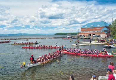 Dragon Boat races on Lake Champlain in Burlington, Vermont to illustrate Out-of-state student fees grab hits new high in US