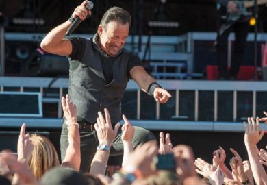 Bruce Springsteen performs with the E Street Band at Hampden Park choosing fans with their hands in the air to illustrate ‘Case can be made’ for differential fees, poll indicates