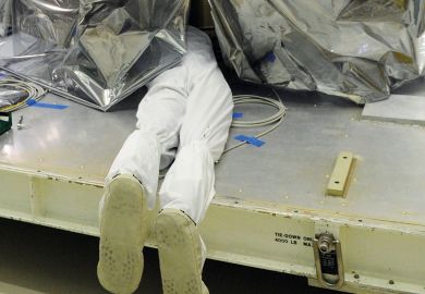 Person underneath a plastic sheet Person underneath a plastic sheet to illustrate Florida university leaders silent as DeSantis rages