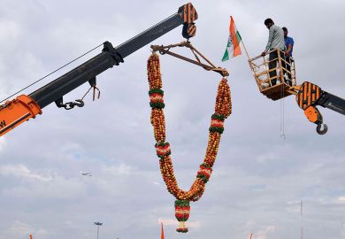 A 20-feet long apple garland is raised with a crane to welcome former Karnataka Minister D.K. Shivakumar, in Bangalore  A 20-feet long apple garland is raised with a crane to welcome former Karnataka Minister D.K. Shivakumar, in Bangalore to illustrate No ‘rush to India’ by top-ranked universities, academics say