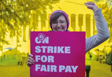 Person on a protest against payments and pensions as more than 70,000 university staff are on strike in the UK