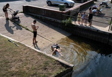 A young woman lies in shallow water after slipping on a boating ramp in Beccles Quay A young woman lies in shallow water after slipping on a boating ramp in Beccles Quay as a metaphor for progress on gender parity in research ‘set back a year’ by Covid