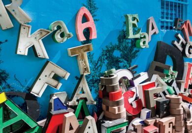 Giant letters scattered and stacked up along a building to illustrate Sloppy writing, sloppy science