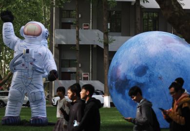 Inflatable models of astronaut and the Moon are on display in Nanjing, Jiangsu Province of China Inflatable models of astronaut and the Moon are on display to illustrate China expands Double First Class universities list