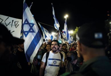 Protesters and Israeli police officers clash during a demonstration near the Israeli Knesset on July 24, 2023 in Jerusalem, Israel. as described in the article