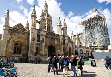 A tour guide speaks to tourists outside the entrance to King's College, University of Cambridge, in Cambridge A tour guide speaks to tourists outside the entrance to King's College, University of Cambridge, in Cambridge to illustrate Cambridge growth plan ‘backs up UK science superpower vision’