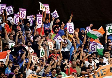 India fans cheer during the men's World Cup India fans cheer during the men's World Cup to illustrate IITs: Can the Indian premier league thrive on the international stage?