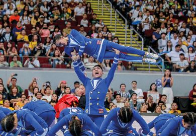Cheering squad from the Ateneo De Manila University perform Cheering squad from the Ateneo De Manila University perform to illustrate Fee-free Philippines degrees ‘threaten the viability of the private sector’