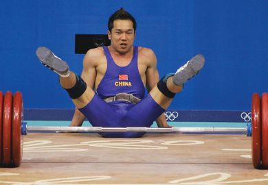 Weightlifter representing China drops the weight and falls on floor Weightlifter representing China drops the weight and falls on floor as a metaphor that Chinese excellence drive ‘may make universities weaker’