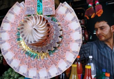 Display of a garland made of Indian currency notes to illustrate Increasing academic salaries must be a priority if India’s new independent research funder is to turbocharge science.