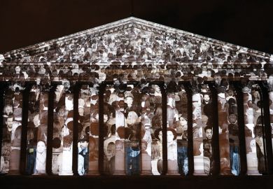 "The Standing March" a Public Artwork By Artist JR and Filmmaker Darren Aronofskyis projected on the facade of the French parliament at Assemblee Nationale to illustrate No amount of technology can replicate the magic of in-person conferences