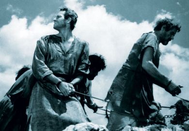 Film still of Ben Hur who has fallen into slavery as a metaphor for universities refuse to ‘slavishly follow’ teacher training plans
