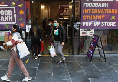 nternational students carry groceries from a foodbank in Melbourne to illustrate Covid spotlights hunger struggles for Australia’s overseas students
