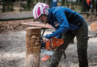 Participant in the Logging Dutch Championships to illustrate Dutch research funding cuts will ‘reverse years of progress’