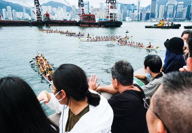 People watch the Hong Kong International Dragon Boat Race People watch the Hong Kong International Dragon Boat Race to illustrate Hong Kong could lift cap on non-locals