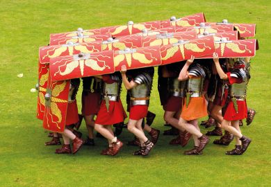 Ermine Street Guard demonstrate the tortoise defensive manoeuvre in display of fighting skills Ermine Street Guard demonstrate the tortoise defensive manoeuvre in display of fighting skills to illustrate OfS accused of lack of transparency over 30 standards probes