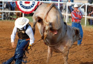 A bullrider about to get kicked to illustrate US reliance on lottery funding raises university concerns