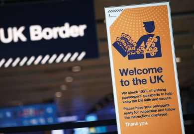 UK border signage is pictured at the passport control in Arrivals to illustrate Can the UK be a science superpower with super-high immigration fees?