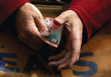 Hands holding an Australian note Hands holding a note as a metaphor for Murdoch councillor quits amid spending questions