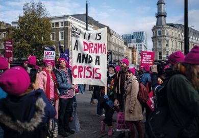 Protesters take part in a union rally  by the University and College Union (UCU) amid strike action by staff  Protesters take part in a union rally  by the University and College Union (UCU) amid strike action by staff to illustrate Eight per cent rise would end strikes, say labour experts