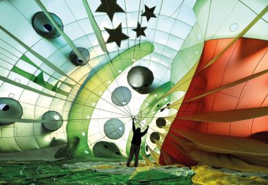 Hot air balloon expanding while being inflated to illustrate UK master’s students less satisfied after rapid sector expansion