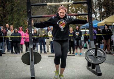 Person carries a  frame loaded with weight to illustrate Stern reforms made REF more burdensome than ever, v-cs complain