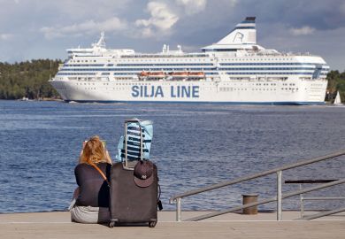 A woman is sitting on the quayside waiting for the boat with her luggage in Lidingo, Sweden A woman is sitting on the quayside waiting for the boat with her luggage in  Lidingo, Sweden to illustrate Grant deadlines ‘create disparity’