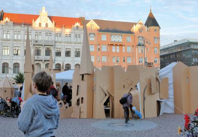 People have built a Cardboardistan, a cardboard city, in the Kasarmitori square at the Night of the Arts, Taiteiden Yo, Helsinki, Finland People have built a Cardboardistan, a cardboard city, in the Kasarmitori square at the Night of the Arts, Taiteiden Yo, Helsinki, Finland to illustrate Relaxed thesis requirements ‘devalue’ PhD, candidates fear